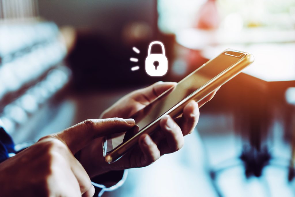 person locking their smartphone